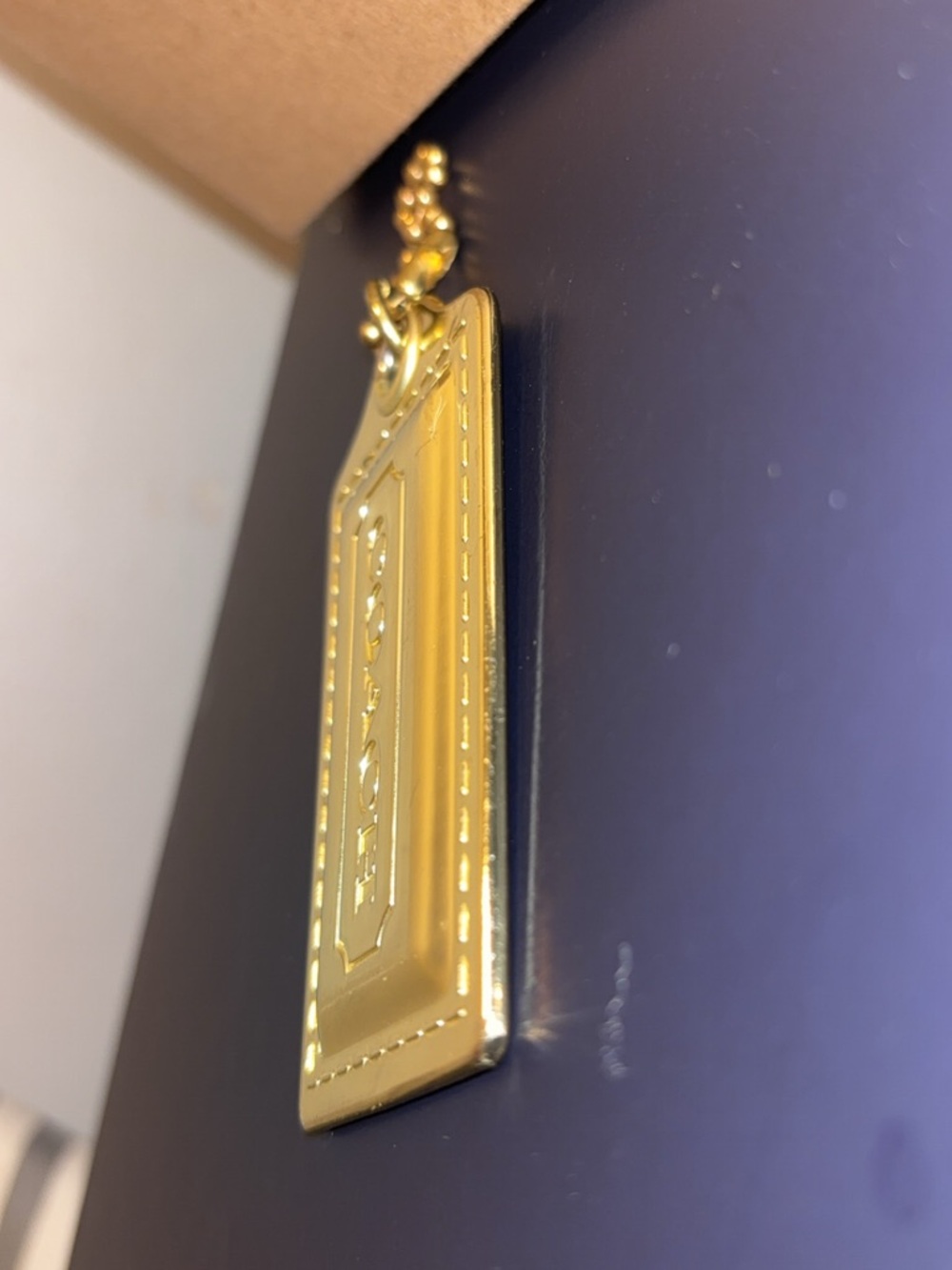 Coach large poppy metallic gold-tone hang tag EUC - Picture 5 of 7